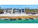 Stunning beachfront home with multiple balconies and expansive ocean views at 4005 Casey Key Rd, Nokomis, FL 34275