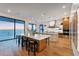 Gourmet kitchen features sleek countertops, modern appliances, and stunning ocean view at 4005 Casey Key Rd, Nokomis, FL 34275