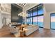 Sophisticated living room featuring high ceilings, modern décor, and panoramic ocean views for luxurious living at 4005 Casey Key Rd, Nokomis, FL 34275