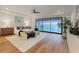 Serene main bedroom with ocean views, a ceiling fan, and stylish furniture at 4005 Casey Key Rd, Nokomis, FL 34275