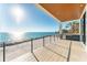 Inviting outdoor kitchen with grill overlooking the ocean, perfect for entertaining at 4005 Casey Key Rd, Nokomis, FL 34275