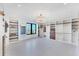 Spacious walk-in closet with custom shelves, drawers, and a decorative light fixture, offering ample storage at 4005 Casey Key Rd, Nokomis, FL 34275