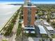 Overhead shot of the brick highrise condo building near the water with covered parking and community pool at 4015 Bayshore Blvd # 11A, Tampa, FL 33611