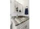 Bathroom features a marble countertop, vanity, decorative hardware and ample lighting at 4015 Bayshore Blvd # 11A, Tampa, FL 33611
