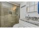 Modern bathroom features a glass-enclosed shower with stone accents and stylish vanity at 4015 Bayshore Blvd # 11A, Tampa, FL 33611