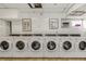 A well-maintained laundry room with multiple high-efficiency washing machines for resident use at 4015 Bayshore Blvd # 11A, Tampa, FL 33611