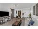 Spacious living room featuring tile floors, decorative art, sliding door and media center at 4015 Bayshore Blvd # 11A, Tampa, FL 33611