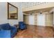 Lobby area with elevators, tile floors, blue chairs, and elegant decor at 4015 Bayshore Blvd # 11A, Tampa, FL 33611