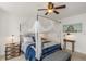 Comfortable main bedroom featuring a canopy bed, ceiling fan, and stylish decor at 4015 Bayshore Blvd # 11A, Tampa, FL 33611
