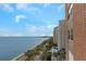 Breathtaking water view from the condo with the road, trees, buildings, and sky visible on a clear day at 4015 Bayshore Blvd # 11A, Tampa, FL 33611