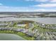 Breathtaking aerial view of the community, set amidst lakes and lush landscapes, offering a serene living environment at 42211 Edgewater Dr, Punta Gorda, FL 33982