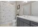 Stylish bathroom featuring a shower-tub combo and a modern vanity at 42211 Edgewater Dr, Punta Gorda, FL 33982