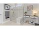 Contemporary bathroom features glass-enclosed shower and stylish decor at 42211 Edgewater Dr, Punta Gorda, FL 33982