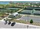 Tennis courts, bocce ball, and golf carts offer active community living by the water at 42211 Edgewater Dr, Punta Gorda, FL 33982