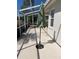 Spacious screened patio featuring an umbrella, ideal for outdoor relaxation and entertaining at 4314 Live Oak Blvd, Palm Harbor, FL 34685
