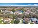 Aerial view of the neighborhood showing the lake with a water feature at 4441 Fieldview Cir, Wesley Chapel, FL 33545