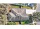 Aerial view of the home's roof, driveway, and surrounding landscape at 4441 Fieldview Cir, Wesley Chapel, FL 33545
