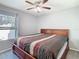 Comfortable bedroom featuring natural light from a window at 4441 Fieldview Cir, Wesley Chapel, FL 33545