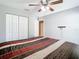 Bedroom with ceiling fan and closet, offering ample space at 4441 Fieldview Cir, Wesley Chapel, FL 33545