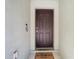 Image of the front door featuring a Welcome Home door mat at 4441 Fieldview Cir, Wesley Chapel, FL 33545