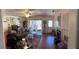 Comfortable living room featuring a fireplace, tile flooring, and access to a private outdoor patio at 5231 Bayshore Blvd # 10, Tampa, FL 33611