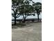 Park featuring picnic tables and benches under shady trees, offering a relaxing and scenic spot for outdoor enjoyment at 5231 Bayshore Blvd # 10, Tampa, FL 33611