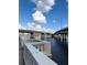 Scenic waterfront view showcasing a picturesque bridge and beautiful blue sky with fluffy white clouds at 5231 Bayshore Blvd # 10, Tampa, FL 33611