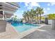 Inviting community pool surrounded by palm trees and comfortable lounge seating at 5351 Bridge St # 71, Tampa, FL 33611