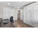Another view of the office showing closet and hall leading to other rooms at 5351 Bridge St # 71, Tampa, FL 33611