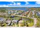 Waterfront home with lush landscaping, picturesque waterways, and breathtaking views of the surrounding community at 5510 Berlin Dr, Port Richey, FL 34668