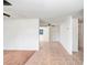 Spacious living room with tile and wood flooring at 5510 Berlin Dr, Port Richey, FL 34668