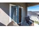 Outdoor balcony features seating and scenic neighborhood views at 5934 Maidenstone Way, Palmetto, FL 34221