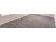 Neutral bedroom carpet with baseboard trim at 5934 Maidenstone Way, Palmetto, FL 34221