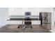 Modern kitchen features granite countertops, stainless steel appliances, and white cabinetry at 5934 Maidenstone Way, Palmetto, FL 34221