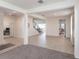 Open-concept living room features tile flooring and plenty of natural light at 5934 Maidenstone Way, Palmetto, FL 34221