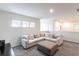 Upstairs loft featuring a comfortable sectional sofa and neutral carpet at 5934 Maidenstone Way, Palmetto, FL 34221
