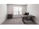 Comfortable office space with large window and neutral carpet at 5934 Maidenstone Way, Palmetto, FL 34221