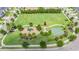 Aerial view of manicured community park and playground at 6870 Talamore Dr, Wesley Chapel, FL 33545