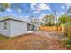 Expansive backyard with a screened-in porch, offering a relaxing outdoor living space at 7030 19Th N Way, St Petersburg, FL 33702