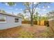 Large backyard with mature trees providing shade and privacy at 7030 19Th N Way, St Petersburg, FL 33702