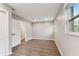 Well-lit bedroom featuring recessed lighting, wood-look flooring, and neutral walls at 7030 19Th N Way, St Petersburg, FL 33702