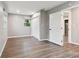 Comfortable bedroom features a spacious closet, wood-look floors, and natural light at 7030 19Th N Way, St Petersburg, FL 33702