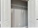 A well-lit closet featuring a single shelf with ample storage space at 7030 19Th N Way, St Petersburg, FL 33702
