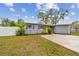 Charming single-story home featuring a well-maintained front yard and painted brick facade at 7030 19Th N Way, St Petersburg, FL 33702