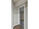 Hallway featuring wood floors and an open doorway to another room at 7030 19Th N Way, St Petersburg, FL 33702