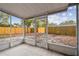 Screened patio with a view of the backyard, offering a serene outdoor space for leisure and enjoying the surrounding landscape at 7030 19Th N Way, St Petersburg, FL 33702