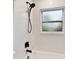 Close up of shower featuring modern fixtures and updated tile at 7030 19Th N Way, St Petersburg, FL 33702