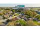 An aerial view shows the surrounding neighborhood with views of the city skyline at 7213 Trinity Pl, Tampa, FL 33610