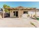 Spacious back patio with cover, featuring ample space for outdoor seating and entertainment at 7213 Trinity Pl, Tampa, FL 33610