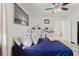 Cozy bedroom with a comfortable bed and ample natural light, creating a relaxing retreat at 7213 Trinity Pl, Tampa, FL 33610